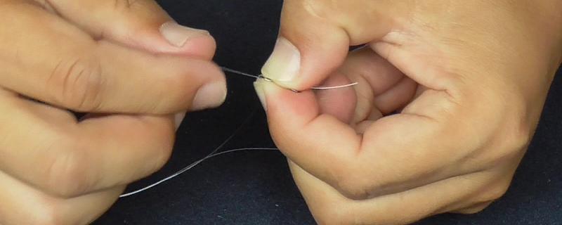 双钩怎么打结，按以下步骤进行